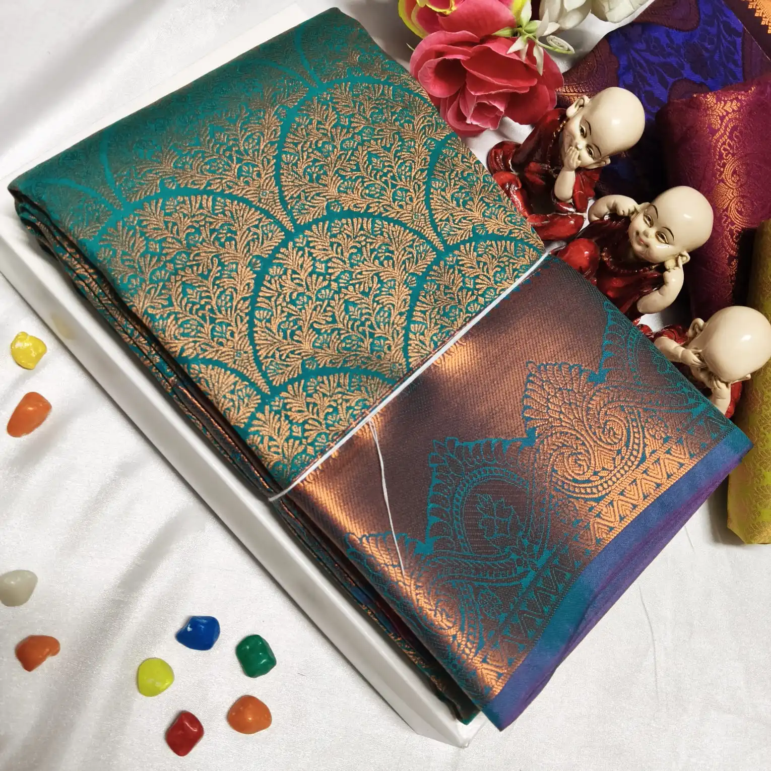 Vastharakala Peacock Feather Motifs Teal Green Soft Silk Saree